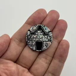 In hand, from Pokémon Coin Fan, full size