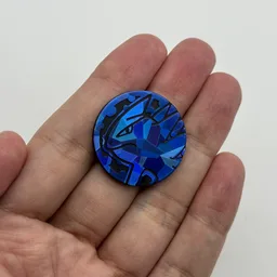 In hand, from Pokémon Coin Fan, full size