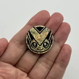 In hand, from Pokémon Coin Fan, full size