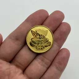 In hand, from Pokémon Coin Fan, full size