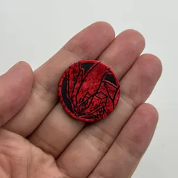 In hand, from Pokémon Coin Fan, full size