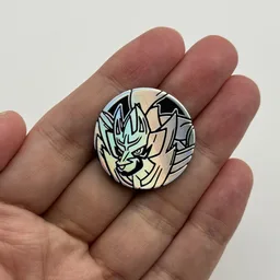 In hand, from Pokémon Coin Fan, full size