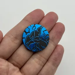 In hand, from Pokémon Coin Fan, full size