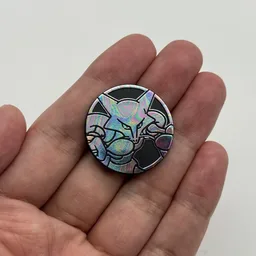 In hand, from Pokémon Coin Fan, full size