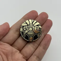 In hand, from Pokémon Coin Fan, full size