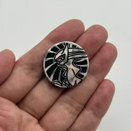 In hand, from Pokémon Coin Fan, full size