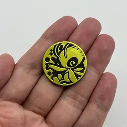 In hand, from Pokémon Coin Fan, full size