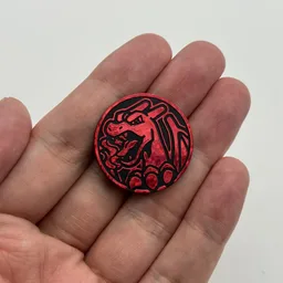 In hand, from Pokémon Coin Fan, full size