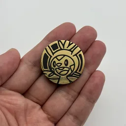 In hand, from Pokémon Coin Fan, full size