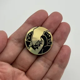 In hand, from Pokémon Coin Fan, full size