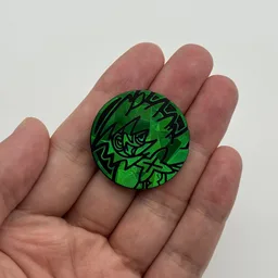 In hand, from Pokémon Coin Fan, full size
