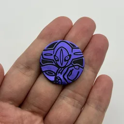In hand, from Pokémon Coin Fan, full size
