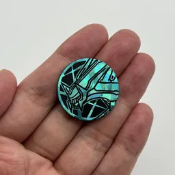 In hand, from Pokémon Coin Fan, full size
