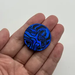 In hand, from Pokémon Coin Fan, full size