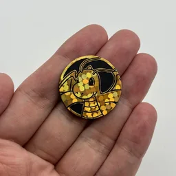 In hand, from Pokémon Coin Fan, full size