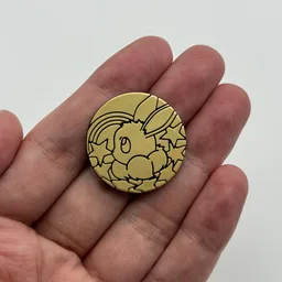 In hand, from Pokémon Coin Fan, full size