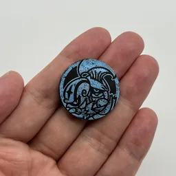 In hand, from Pokémon Coin Fan, full size