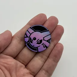 In hand, from Pokémon Coin Fan, full size