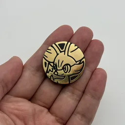 In hand, from Pokémon Coin Fan, full size