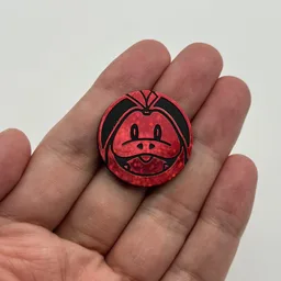 In hand, from Pokémon Coin Fan, full size
