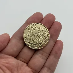 In hand, from Pokémon Coin Fan, full size