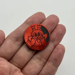In hand, from Pokémon Coin Fan, full size
