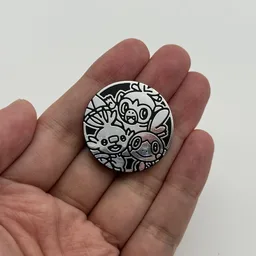 In hand, from Pokémon Coin Fan, full size