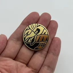 In hand, from Pokémon Coin Fan, full size