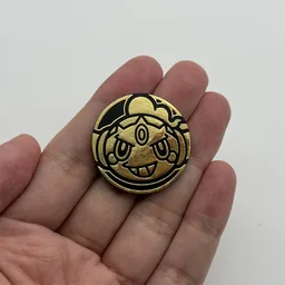 In hand, from Pokémon Coin Fan, full size