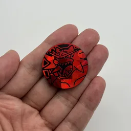 In hand, from Pokémon Coin Fan, full size