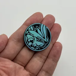 In hand, from Pokémon Coin Fan, full size