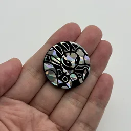 In hand, from Pokémon Coin Fan, full size
