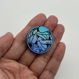 In hand, from Pokémon Coin Fan, full size