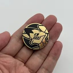 In hand, from Pokémon Coin Fan, full size
