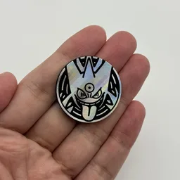 In hand, from Pokémon Coin Fan, full size