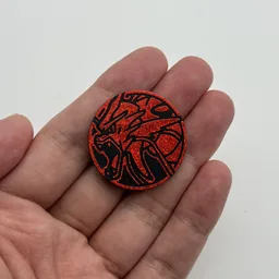 In hand, from Pokémon Coin Fan, full size