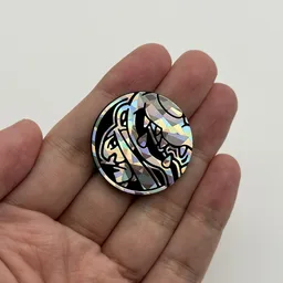 In hand, from Pokémon Coin Fan, full size