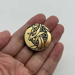 In hand, from Pokémon Coin Fan, full size