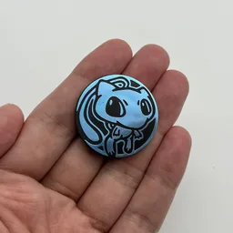 In hand, from Pokémon Coin Fan, full size