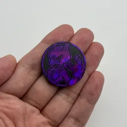 In hand, from Pokémon Coin Fan, full size