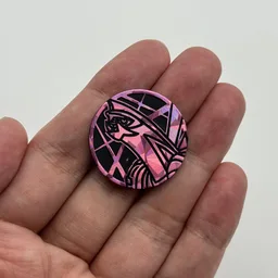 In hand, from Pokémon Coin Fan, full size