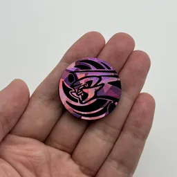 In hand, from Pokémon Coin Fan, full size