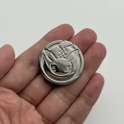 In hand, from Pokémon Coin Fan, full size