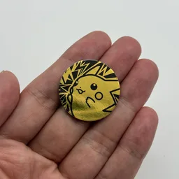 In hand, from Pokémon Coin Fan, full size