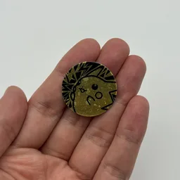 In hand, from Pokémon Coin Fan, full size