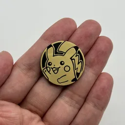 In hand, from Pokémon Coin Fan, full size