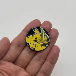 In hand, from Pokémon Coin Fan, full size