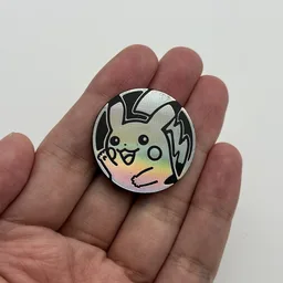 In hand, from Pokémon Coin Fan, full size