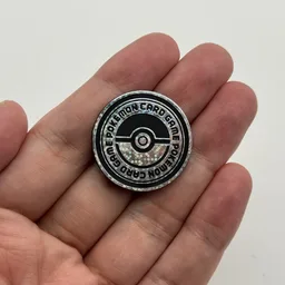 In hand, from Pokémon Coin Fan, full size