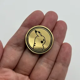 In hand, from Pokémon Coin Fan, full size